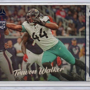 TRAVON WALKER 2022 Panini Chronicles Luminance #223 Tarjeta de fútbol paralela azul #/99 - Jacksonville Jaguars