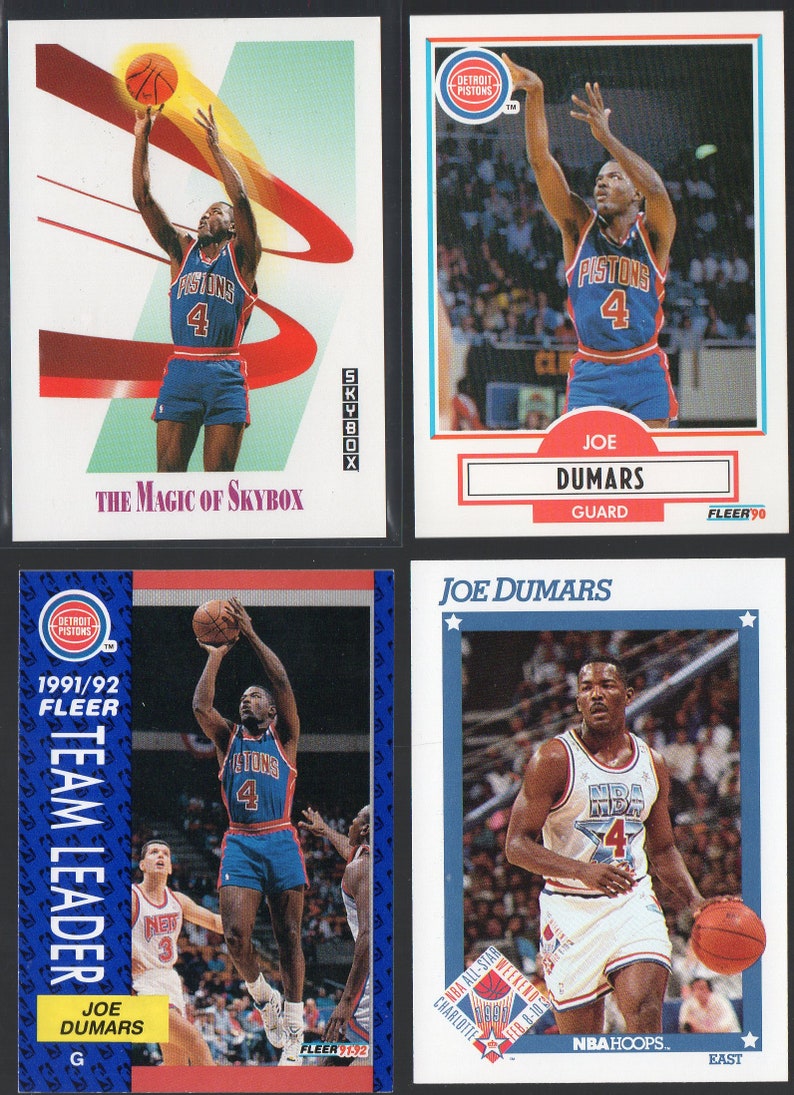 May include: Four trading cards featuring a basketball player, Joe Dumars, wearing a blue and white Detroit Pistons uniform. The cards are from the 1991-92 Fleer Team Leader series and the 1990 Fleer series. The cards feature photos of Dumars in action, along with his name, position, and team.