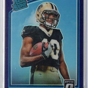 Tarjeta de fútbol TRE'QUAN SMiTH RC 2018 Donruss Optic #175 Purple Prizm Parallel #/50 - New Orleans Saints
