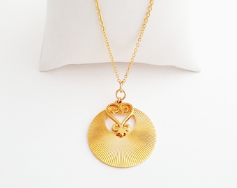 Collier ethnique adinkra en or pendentif cœur, symbole Ashanti Sankofa