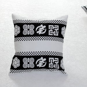 Ethnic printed cushion cover 40 cm X 40 cm. Cushion cover with adinkras patterns.