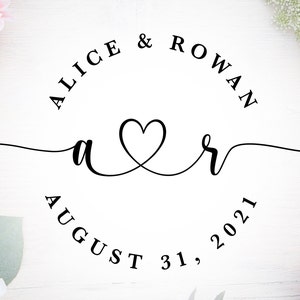 May include: A black and white wedding announcement with the names Alice & Rowan and the date August 31, 2021. The initials "a" and "r" are intertwined with a heart.