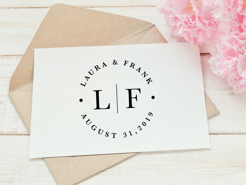Wedding monogram logo design with first names, initials, and wedding date