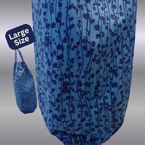 1246 Blue Plastic Bag Holder has abstract art print of dots and wavy lines for contemporary style and decor. Large Size 28" L, 10-1/4" W