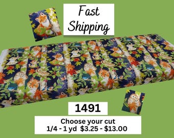 May include: A fabric roll with a repeating pattern of foxes, owls, and other forest creatures. The fabric has a dark blue background with vertical white stripes and colorful leaves. The text "Fast Shipping" is visible.