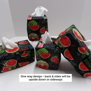 May include: Four black and green tissue box covers with a watermelon print. The covers feature the text "Life is better with watermelon", "Sweet", "Farmers Market", and "Market".