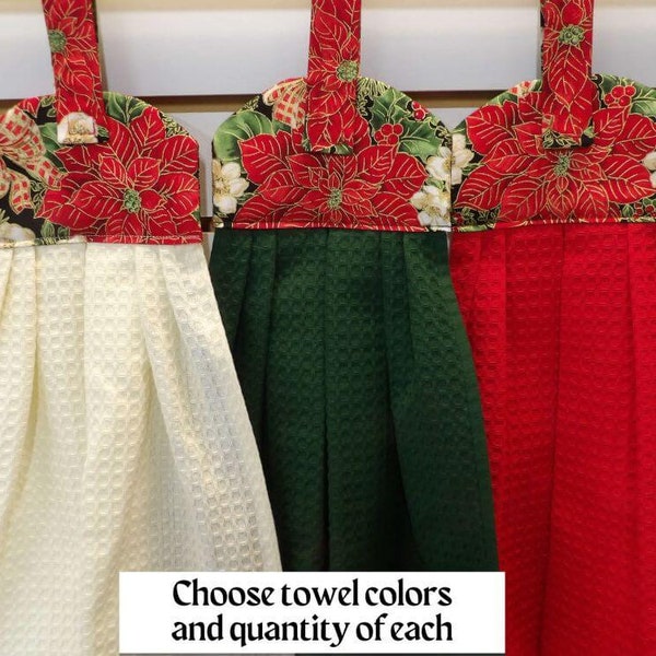 1468 Christmas hanging dish towels with poinsettia bouquets, pine cones, greenery, ribbons; Choose color, quantity. Cream, Dark Green, Red.