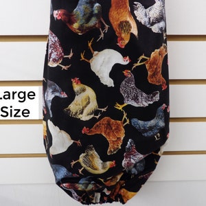 May include: A black reusable grocery bag with a pattern of colorful chickens. The bag is large and has a drawstring closure. The text "Large Size" is printed on a white label.
