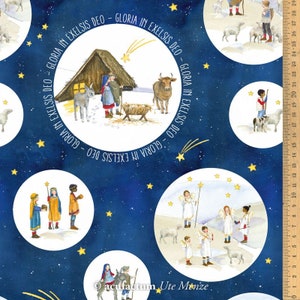 May include: A fabric with a dark blue background featuring white circles with nativity scenes. The circles are surrounded by yellow stars. Text in a circle reads "GLORIA IN EXELSIS DEO". The image includes illustrations of angels, shepherds, and the nativity scene.