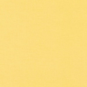 May include: A solid yellow background.