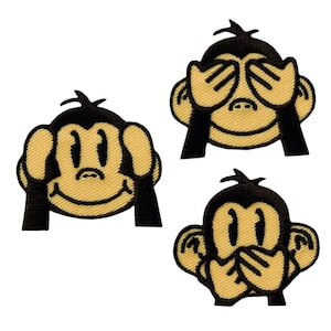 May include: Three cartoon monkeys with black fur and yellow faces. The first monkey is covering its eyes with its hands, the second monkey is covering its ears with its hands, and the third monkey is covering its mouth with its hands.