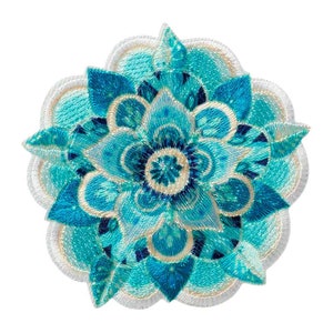 May include: A blue and white embroidered flower patch with a detailed mandala design. The patch is perfect for adding a touch of bohemian style to clothing, bags, or other crafts.