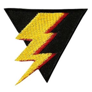 Può includere: Toppa triangolare nera con un fulmine giallo e rosso.