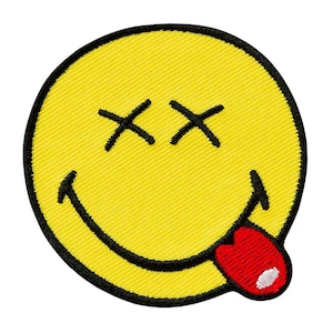 Peut inclure: Visage jaune souriant avec des yeux noirs et un contour noir. Les yeux sont barrés d'une croix et la bouche est incurvée en un sourire. Le visage souriant a une langue rouge qui sort.