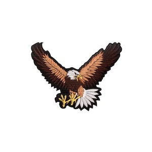 Peut inclure: Un patch brodé représentant un aigle chauve avec ses ailes déployées, en vol. L'aigle est brun et blanc avec un bec et des serres jaunes.
