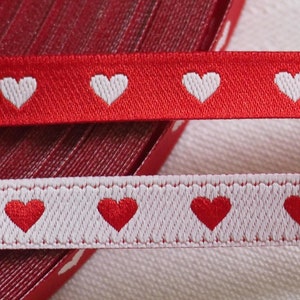 3 m woven ribbon with heart, red and white, 7 mm wide, sew