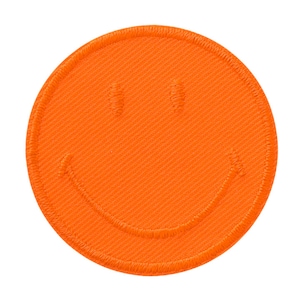 Op de afbeelding: Oranje smiley-face patch met een gestikte rand.