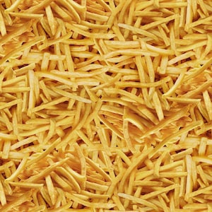May include: A close-up image of a pile of golden brown french fries.