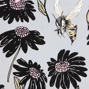 May include: A black and white illustration of a bee with a pink and black floral pattern on a light grey background.