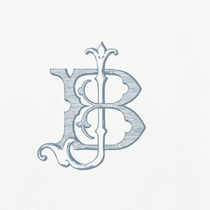 May include: A blue-gray monogram design featuring the intertwined letters "J" and "B" in an ornate, vintage style. The letters are embellished with decorative flourishes and a stylized crown element, set against a textured white background.
