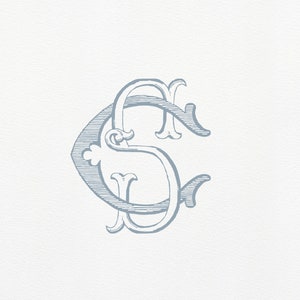 May include: A monogram design featuring the letters "C" and "S" intertwined in a decorative, stylized font. The letters are in a light blue color and are set against a white background.