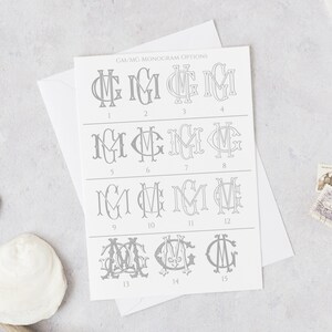 Może przedstawiać: Biała karta z 15 r&oacute;żnymi opcjami monogramu dla liter GM lub MG. Opcje są ponumerowane od 1 do 15. Karta zawiera tekst "GM/MG MONOGRAM OPTIONS" u g&oacute;ry.