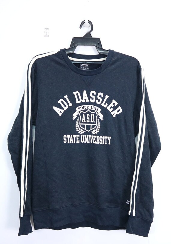 adi dassler logo