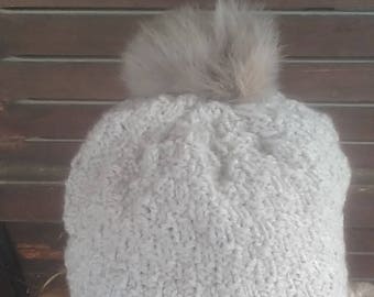 Knitted hat with real fur pom pom