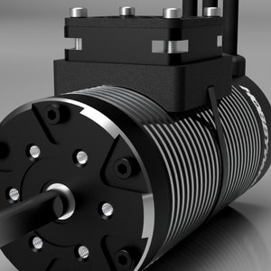 May include: A black electric motor with a silver cooling fin and a black housing. The motor has a shaft extending from the front and a connector on the top.