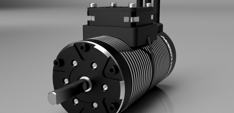 May include: A black electric motor with a silver cooling fin and a black housing. The motor has a shaft extending from the front and a connector on the top.