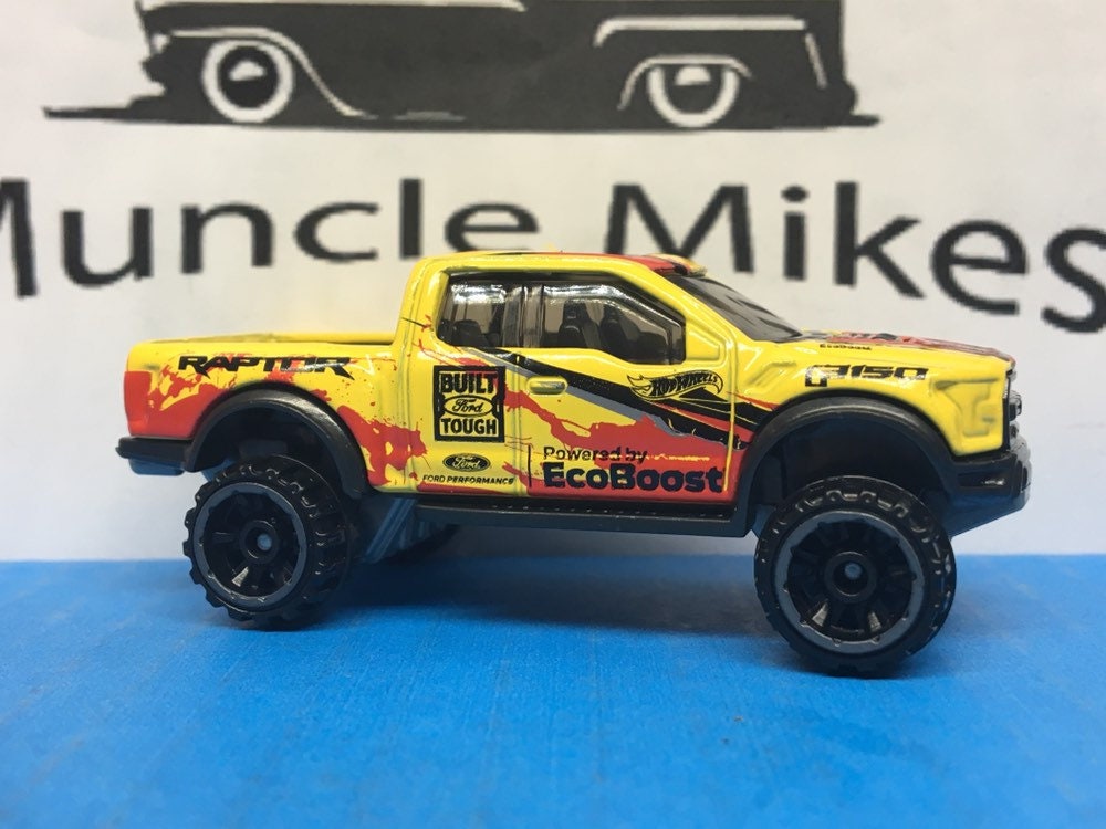Collectible 2018 Hot Wheels 2017 Ford F150 Raptor 6.2 Pick Up Truck YELLOW With Custom Clear Display Case