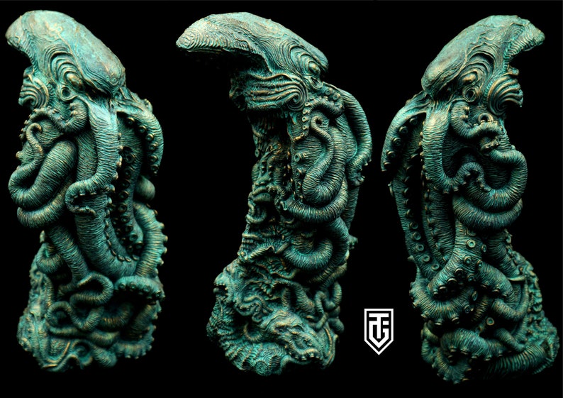 May include: A detailed, green and gold, sculpted octopus figurine. The octopus is curled up with its tentacles wrapped around itself. The figurine is made of a textured material and has a realistic appearance.