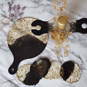 Resin Entertainers Set for 4, a Round Platter, a Wine Butler for 4  glasses, and 4 geode styled Coasters