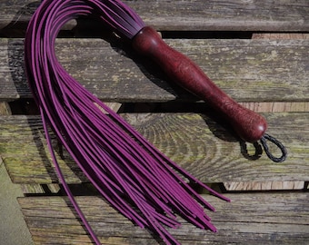 Purple pull up leather flogger