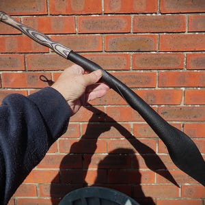 Black leather dragontail