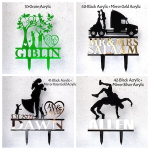 May include: Four acrylic cake toppers with stakes. Top left: green tree design with "GIBLIN" and "Mr & Mrs". Top right: black and gold truck with "MR & MRS SALAAM". Bottom left: black and rose gold with "DAWN", "3.31.2022", and "Mr & Mrs". Bottom right: black and silver with "ALLEN" and a wrestling figure.