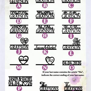 May include: A collection of black cake topper designs labeled A through R, featuring various fonts and layouts with text such as Mr & Mrs Grayson, Jason & Rachel, and dates like 05.16.26. The display includes heart motifs and custom name options.