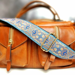 Guitar strap for bags and purses with Arabic design in blue tones, interchangeable with any of your favorite bags. Purse NOT included.