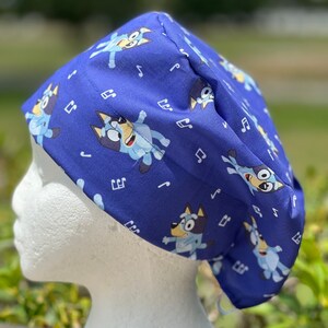 Dark blue woman scrub hat w/free buttons, plastic surgeon cap,nurse,CNA,vet,pharmacist,X-ray tech,laser tech,skin doctor,baker,chef !