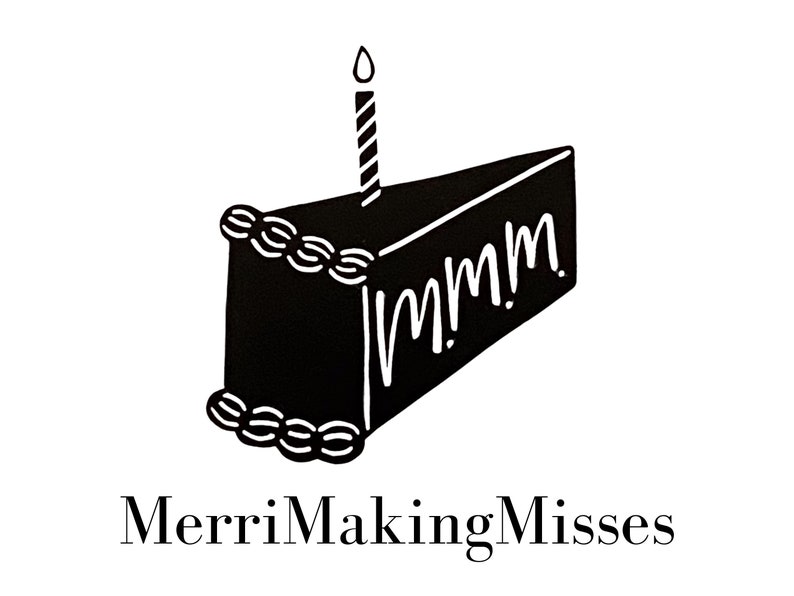 May include: Black and white illustration of a slice of cake with a lit candle. The cake has white frosting details and the word "mmmm" in white. The text "MerriMakingMisses" is below the cake.