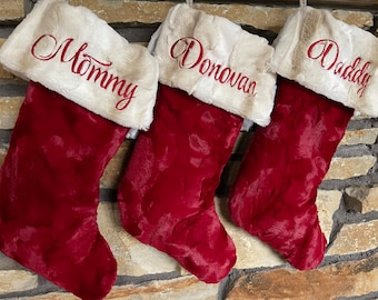 Traditional Christmas Stockings.  Fur Cuffs are ivory and tan with a Wooden Snowflake Ornament.  Very Soft Stockings