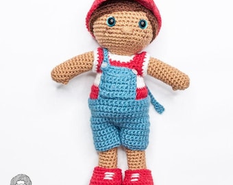 Schema per realizzare all'uncinetto una bambola amigurumi di un bambino con vestiti rimovibili (schema in PDF)