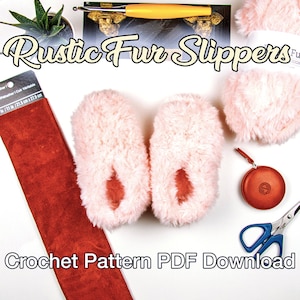 May include: Two pairs of fuzzy slippers. One pair is gray and the other pair is pink.