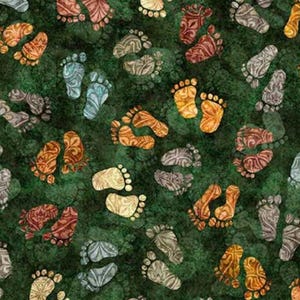 May include: A dark green fabric featuring a repeating pattern of human footprints in various colors including orange, red, blue, and grey. Each footprint contains a detailed, swirling decorative design throughout its surface.