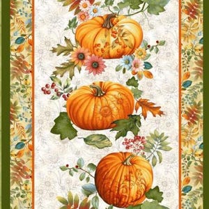 May include: A fabric panel featuring a central vertical column of three orange pumpkins surrounded by autumn leaves, berries, and flowers on a cream background, flanked by two dark green borders with an intricate gold and teal scrollwork pattern.