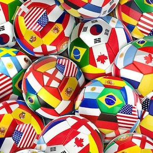 May include: A collection of soccer balls with various national flags displayed on their panels. The balls feature flags from the United States, Brazil, Canada, South Korea, and Spain, among others. The soccer balls are arranged closely together, creating a colorful and patriotic display.