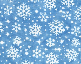 May include: A blue fabric with a repeating pattern of white snowflakes and small white stars. The snowflakes vary in size and design, creating a winter or holiday theme. The fabric has a textured appearance.