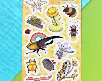 May include: A sticker sheet featuring various cartoon insects and bugs, including a beetle, dragonfly, and caterpillar. The sheet has a yellow background with star patterns and the text "CARDINAL CUSACK @CARDINALCROWNS".