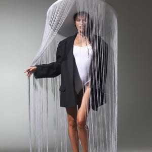 White Statement Fringed Hat with Wide Brim - Ideal for Photoshoots and Interior Styling.Hat with fringes for a photoshoot or for the interio