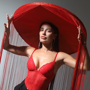 Red Statement Fringed Hat with Wide Brim - Ideal for Photoshoots and Interior Styling Hat with fringes for a photoshoot or for the interior.